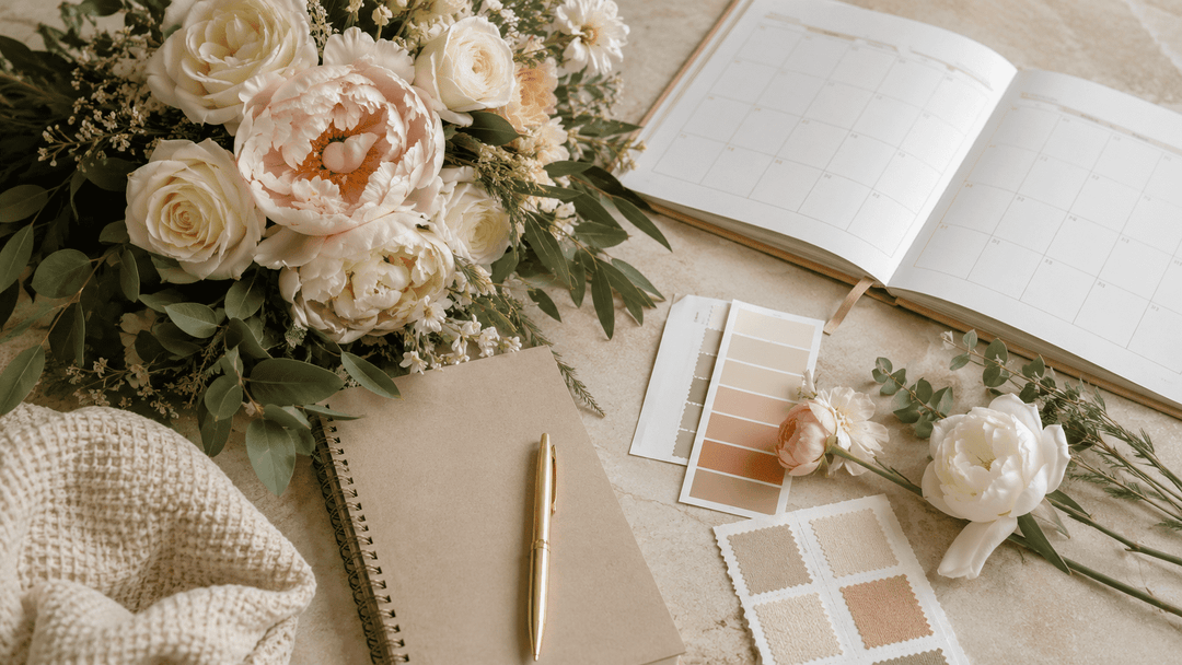 A sophisticated editorial-style wedding flower planning scene for a 2026 wedding flower cost report