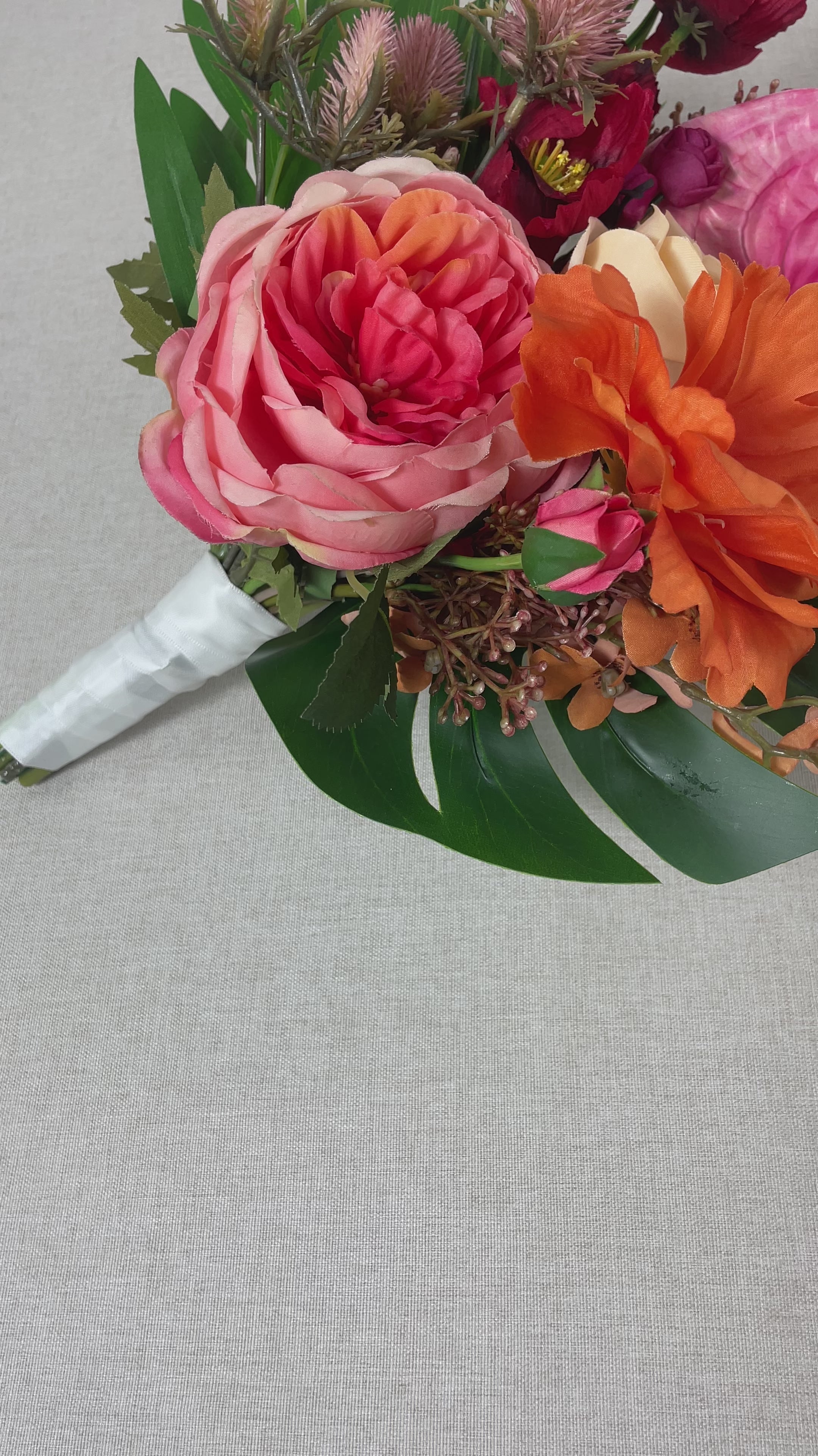 9.8 inch wide Tropical Orange & Pink Bridesmaid Bouquet